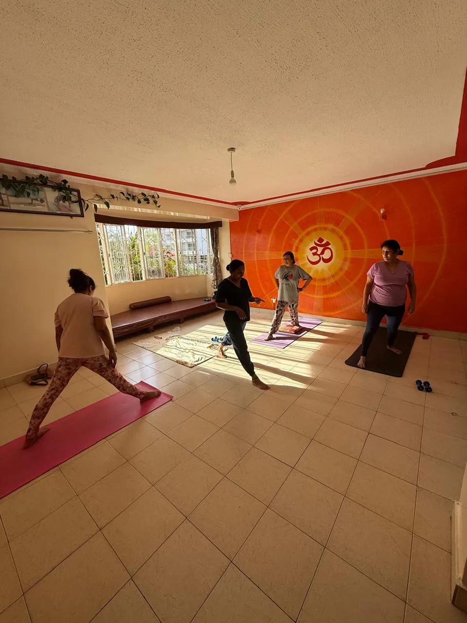 Indoor group yoga session at Pathak's Vitality